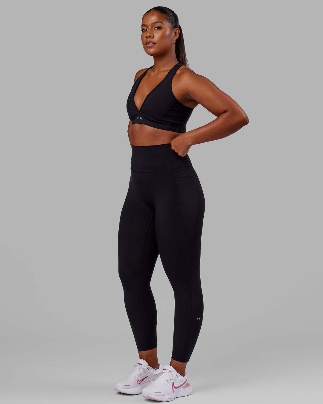 Woman wearing O.G. Fusion Ultra High-Rise Full Length Legging Pockets - Black | Model:Krystal | Size:L - view 2