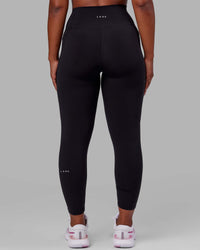 Woman wearing O.G. Fusion Ultra High-Rise Full Length Legging Pockets - Black | Model:Krystal | Size:L | Thumbnail Index: 2