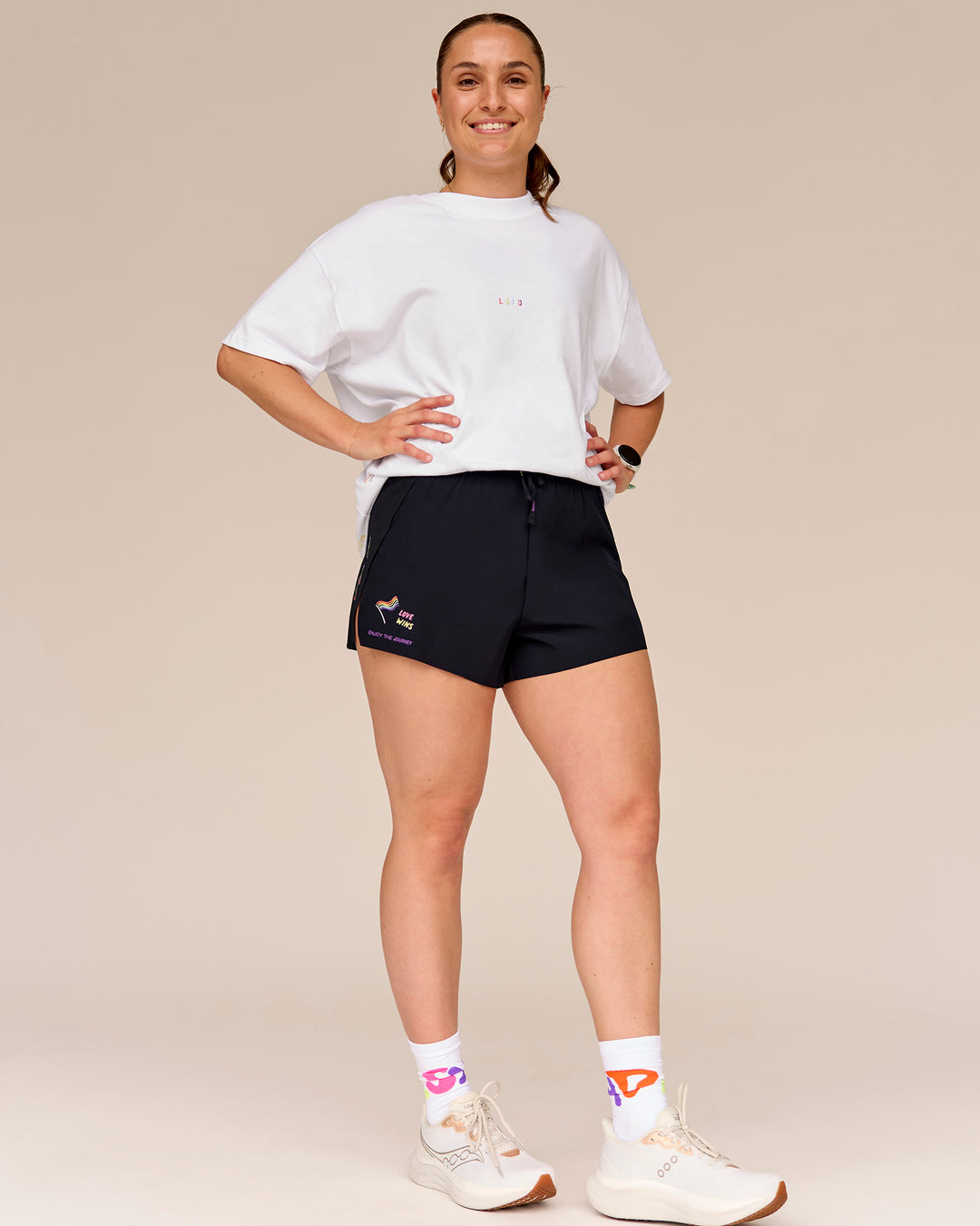 Woman wearing Accelerate 3" High-Rise Running Short - Black-Radiate - view 10