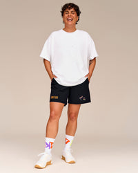 Man wearing Pride Sticker Boxy Tee - White | Thumbnail Index: 2