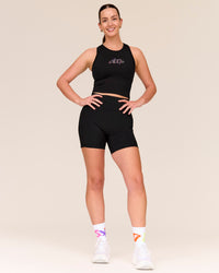 Woman wearing Flow Graphic Performance Tank 2.0 - Black-Radiate | Thumbnail Index: 2