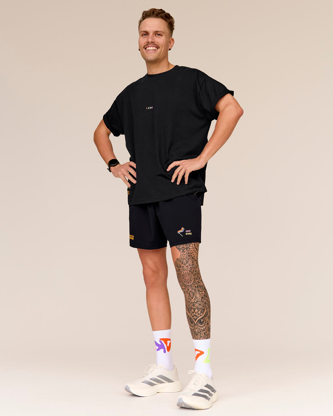 Man wearing Pride Sticker Boxy Tee - Black - view 2