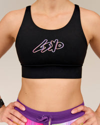 Woman wearing Accelerate Graphic Sports Bra - Black-Radiate | Thumbnail Index: 0