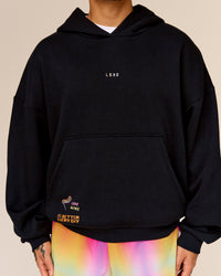 Man wearing Pride Sticker Boxy Hoodie - Black | Thumbnail Index: 1