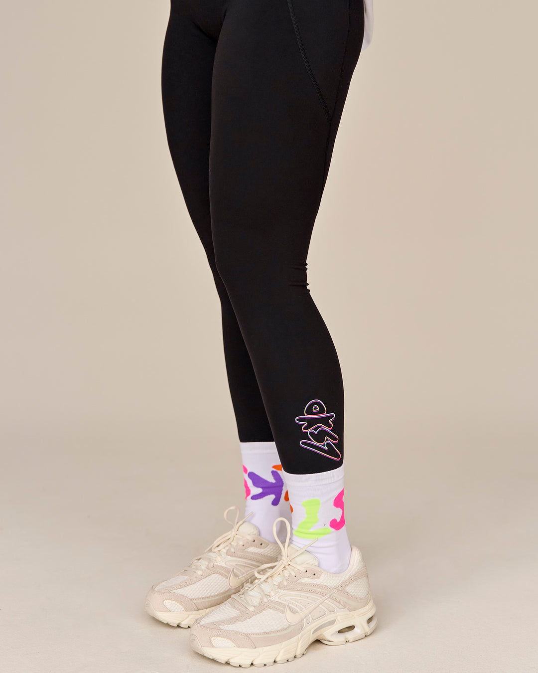 Woman wearing Fusion Graphic Ultra High-Rise Full Length Legging Pockets - Black-Radiate - view 1