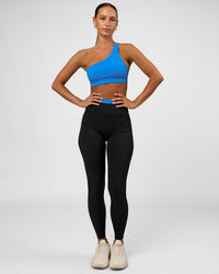 Woman wearing Liberate High-Rise Full Length Legging Pockets - Black-Palace Blue | Model:Brylee | Size:XS | Thumbnail Index: 4
