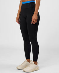 Woman wearing Liberate High-Rise Full Length Legging Pockets - Black-Palace Blue | Model:Brylee | Size:XS | Thumbnail Index: 3