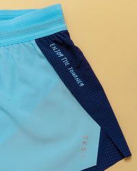 Flatlay GG Accelerate 3" High-Rise Running Short - Future Navy-Baltic Sea | Thumbnail Index: 3