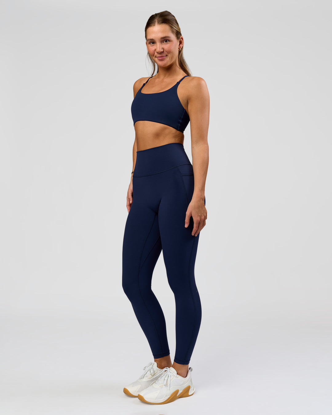 Woman wearing O.G. Fusion Ultra High-Rise Full Length Legging Pockets - Future Navy | Model:Amity| Size:S - view 5