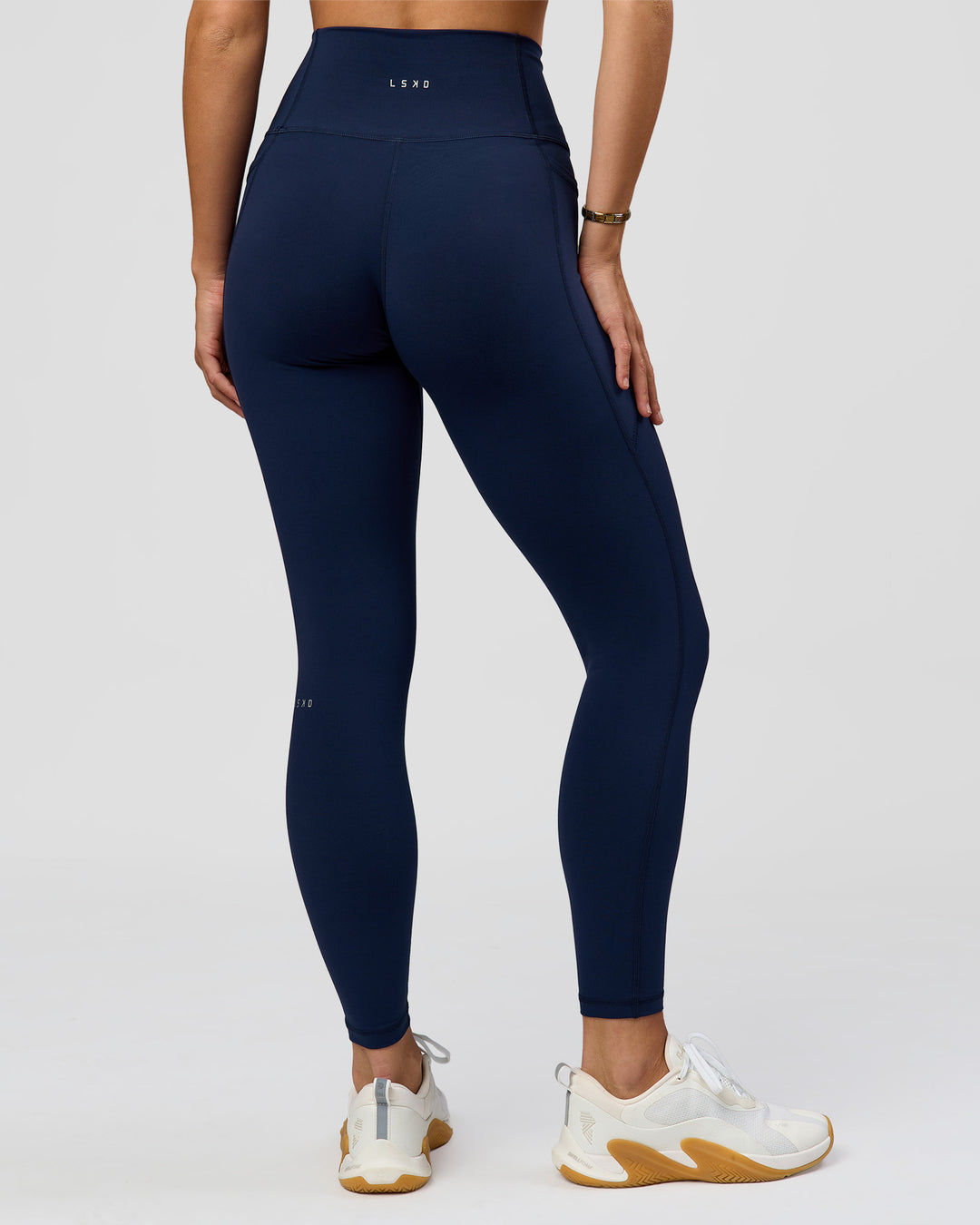 Woman wearing O.G. Fusion Ultra High-Rise Full Length Legging Pockets - Future Navy | Model:Amity| Size:S - view 4