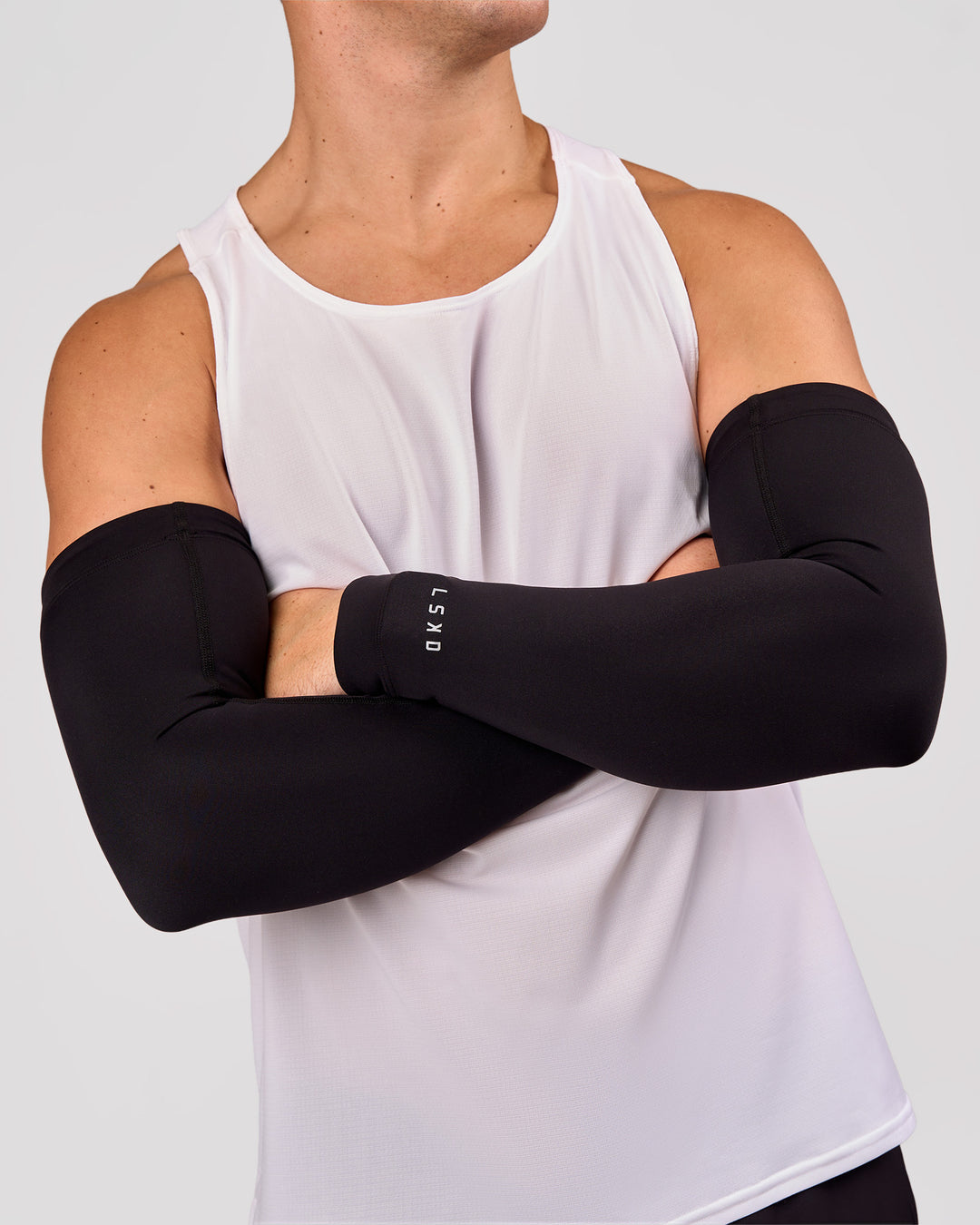 Man wearing Pace Run Sleeves - Black - view 1