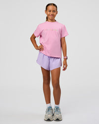 Kid wearing Kids Enjoy the Journey FLXCotton Tee - Bubblegum | Model:Jayla | Size:10 | Thumbnail Index: 0
