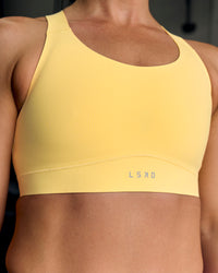 Woman wearing Fusion Sports Bra 2.0 - Lemon | Thumbnail Index: 12