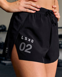 Woman wearing Accelerate 3" High-Rise Running Short - Black-Tech Department | Thumbnail Index: 17