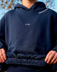 Woman wearing Zola Oversized Hoodie - Future Navy | Model:Brianna | Size:M | Thumbnail Index: 2