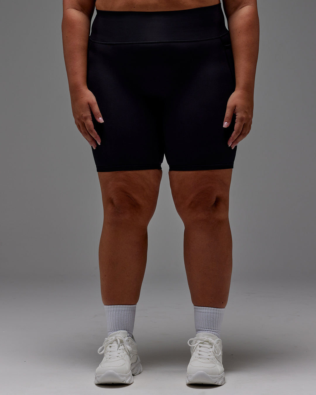 Woman wearing Fusion Ultra High-Rise 9" Short Pockets - Black | Model:Jordie | Size:2XL - view 14