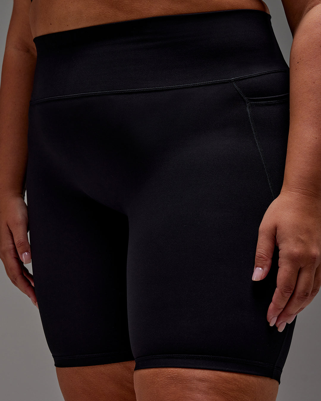 Woman wearing Fusion Ultra High-Rise 9" Short Pockets - Black | Model:Jordie | Size:2XL - view 13