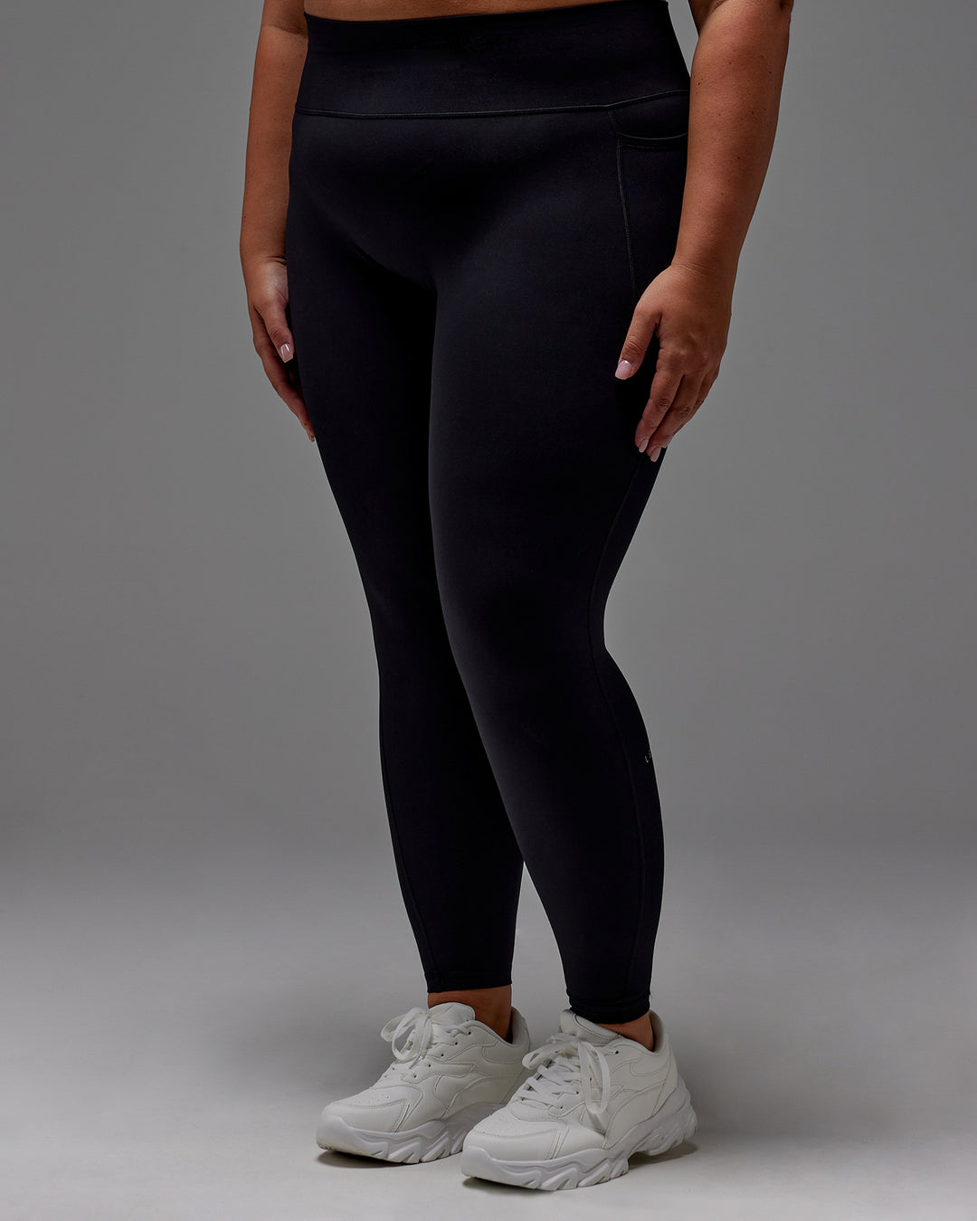 Woman wearing Fusion Ultra High-Rise Full Length Legging Pockets - Black | Model:Jordie | Size:2XL - view 33