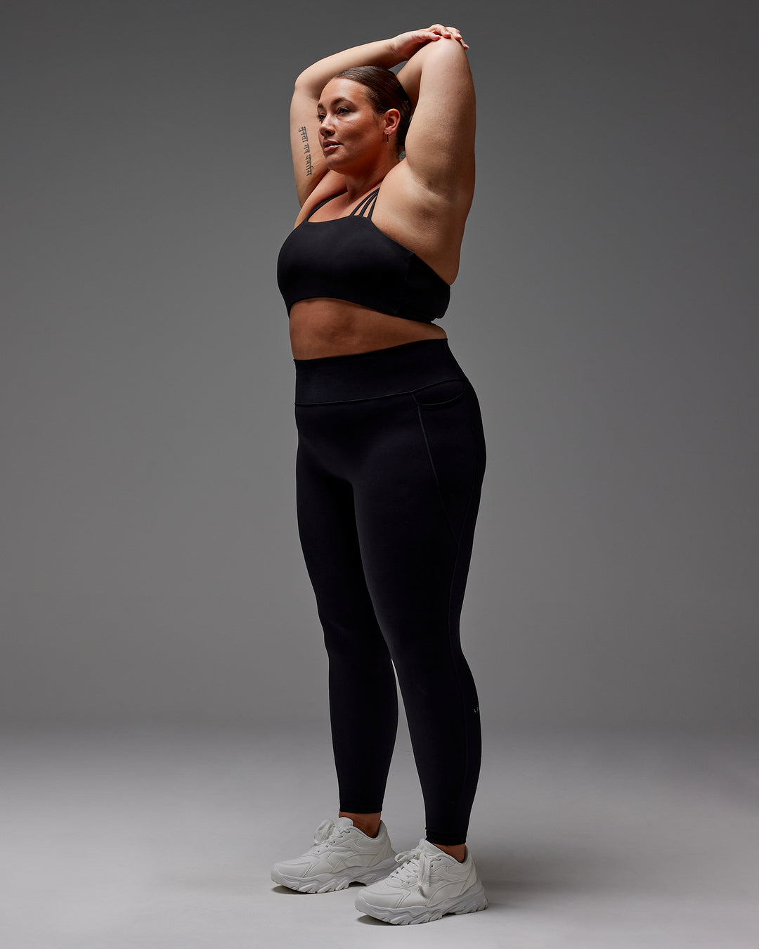 Woman wearing Fusion Ultra High-Rise Full Length Legging Pockets - Black | Model:Jordie | Size:2XL - view 35