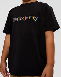 Kid wearing Kid wearing Kids Enjoy the Journey FLXCotton Tee - Bubblegum | Model:Jax | Size:6 | Thumbnail Index: 1