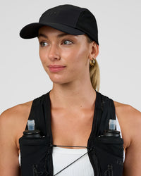 Woman wearing Accelerate Cap - Black | Thumbnail Index: 0