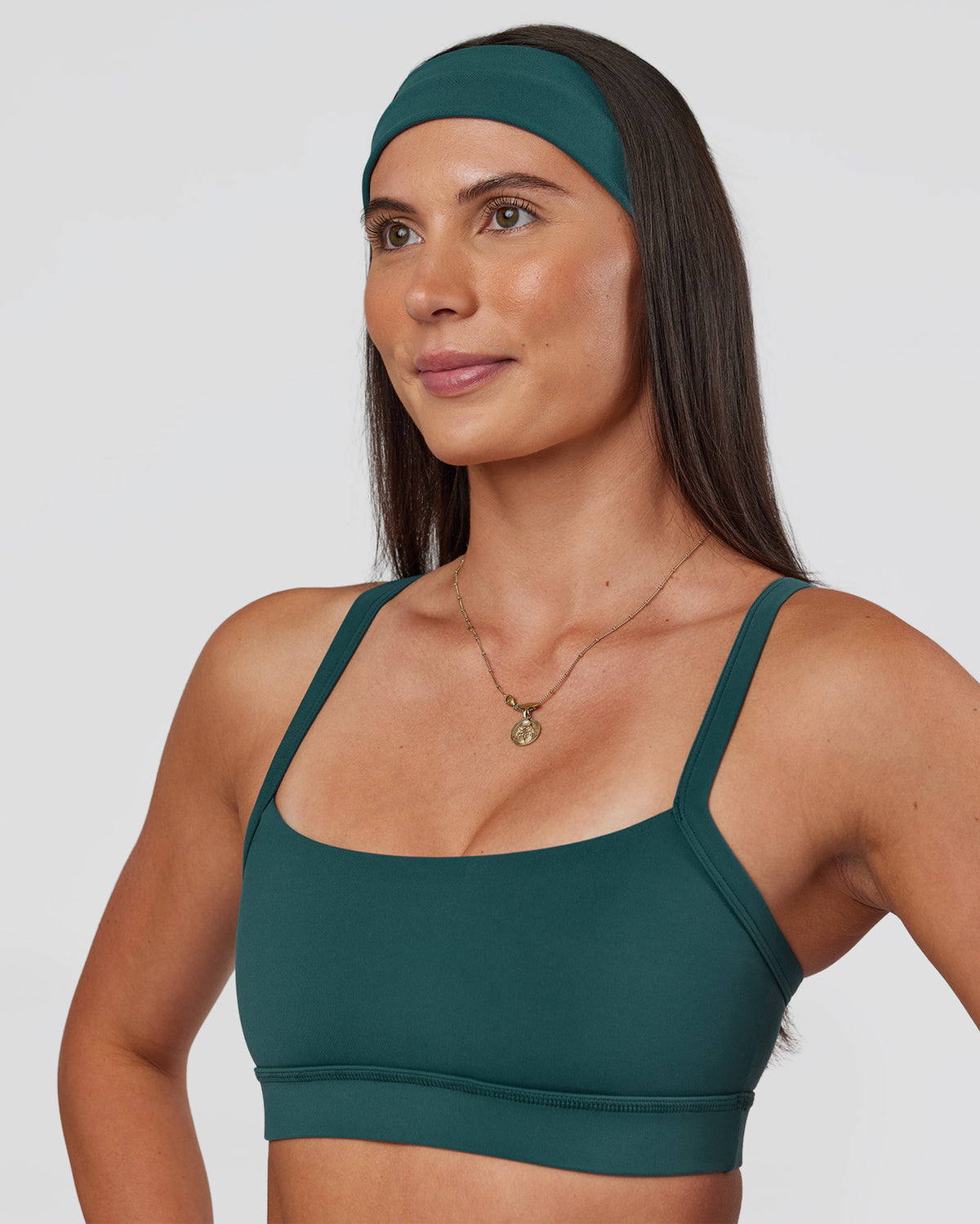 Woman wearing All Day Headband - Transformative Teal