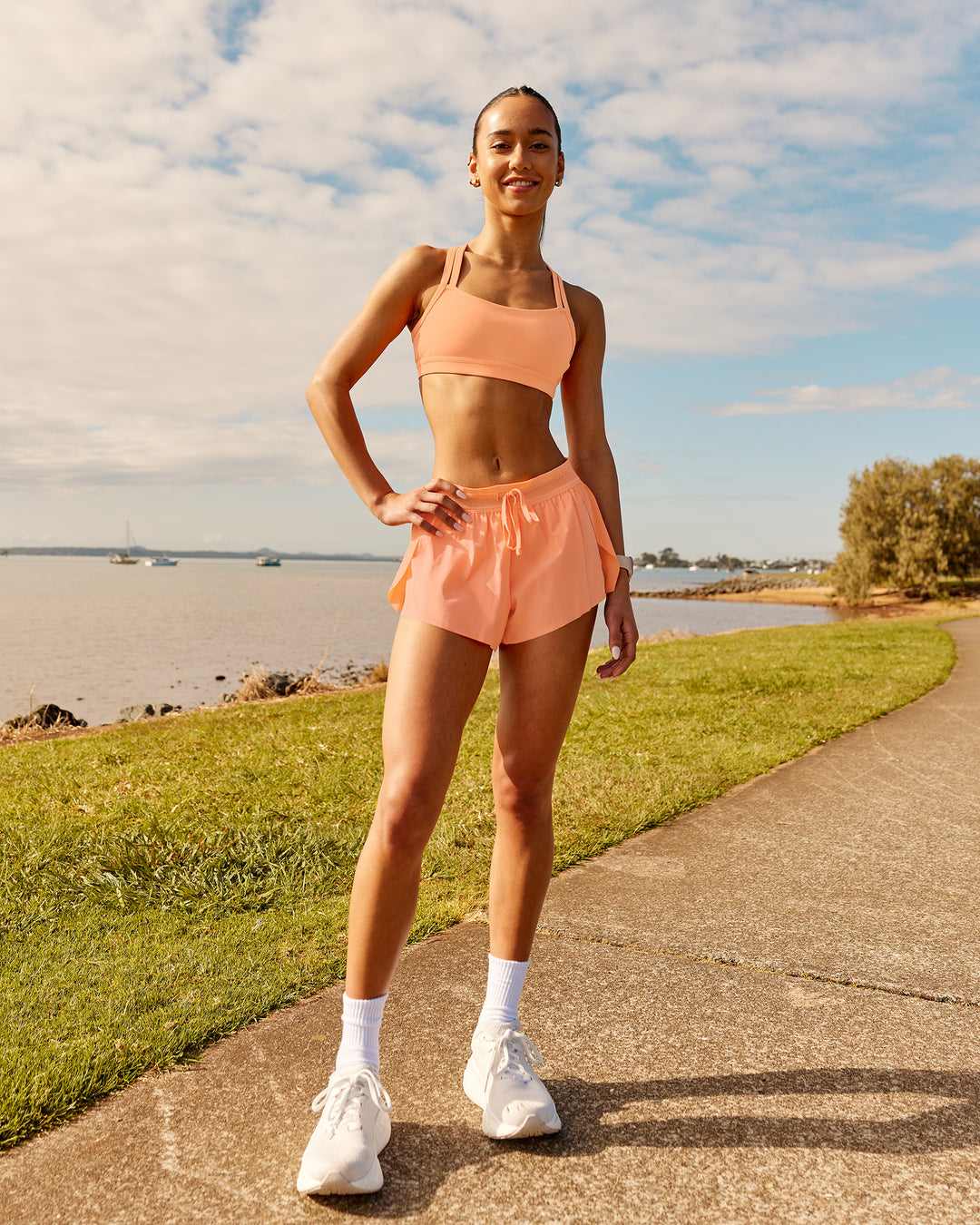 Woman wearing Accelerate 3" Running Short - Cantaloupe | Model:  | Size: - view 12