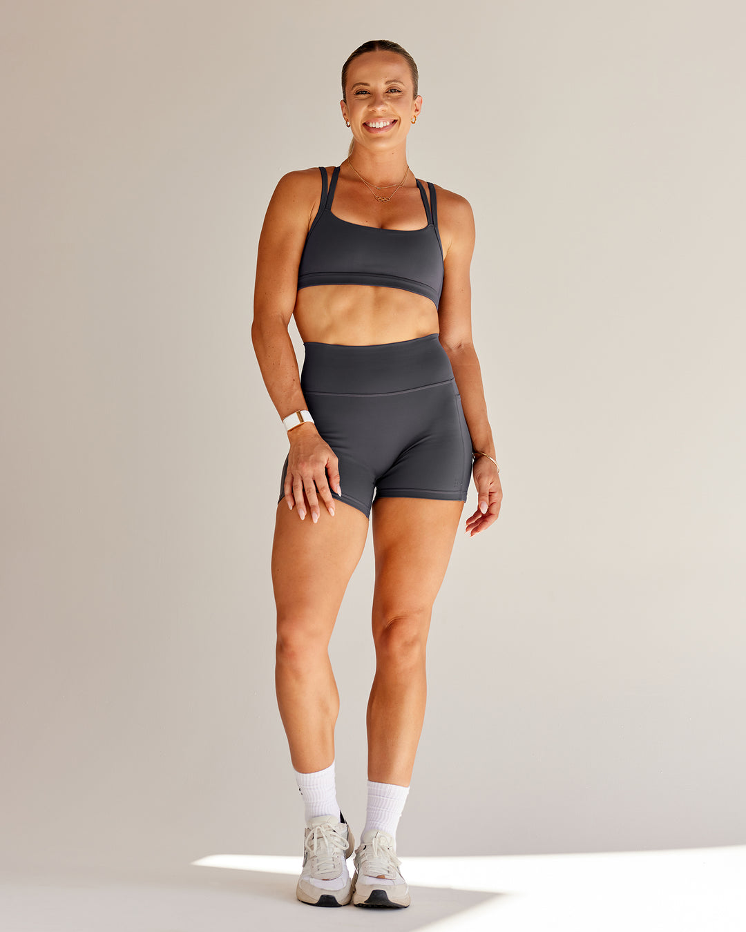 Woman wearing Bree Masters Velocity Sports Bra - Stormy - view 3