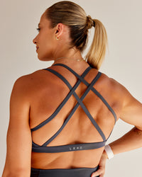 Woman wearing Bree Masters Velocity Sports Bra - Stormy | Thumbnail Index: 1