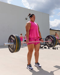 Woman wearing Breeze Training Tank - Ultra Pink | Thumbnail Index: 1