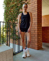 Woman wearing Charge PimaFLX-Lite Active Tank - Black | Thumbnail Index: 4