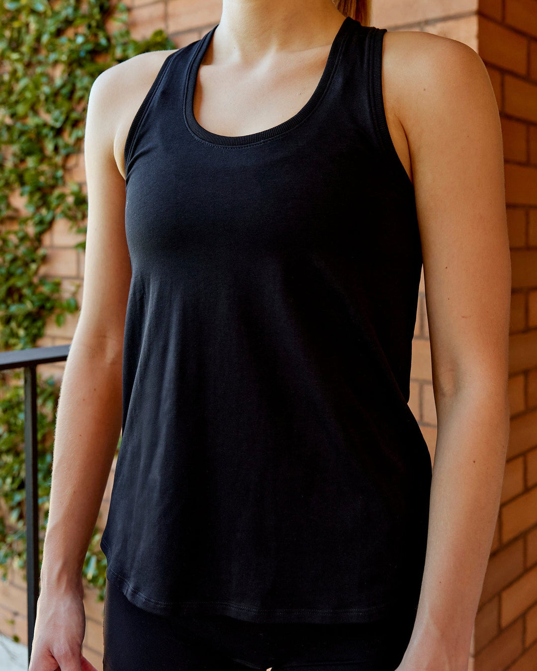 Woman wearing Charge PimaFLX-Lite Active Tank - Black - view 2