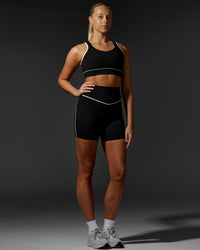 Woman wearing Contrast Ultra High-Rise 6" Short - Black-White | Thumbnail Index: 1