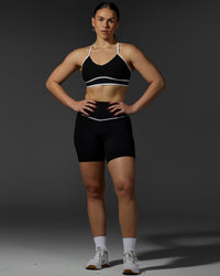Woman wearing Contrast Sports Bra - Black-White | Thumbnail Index: 3