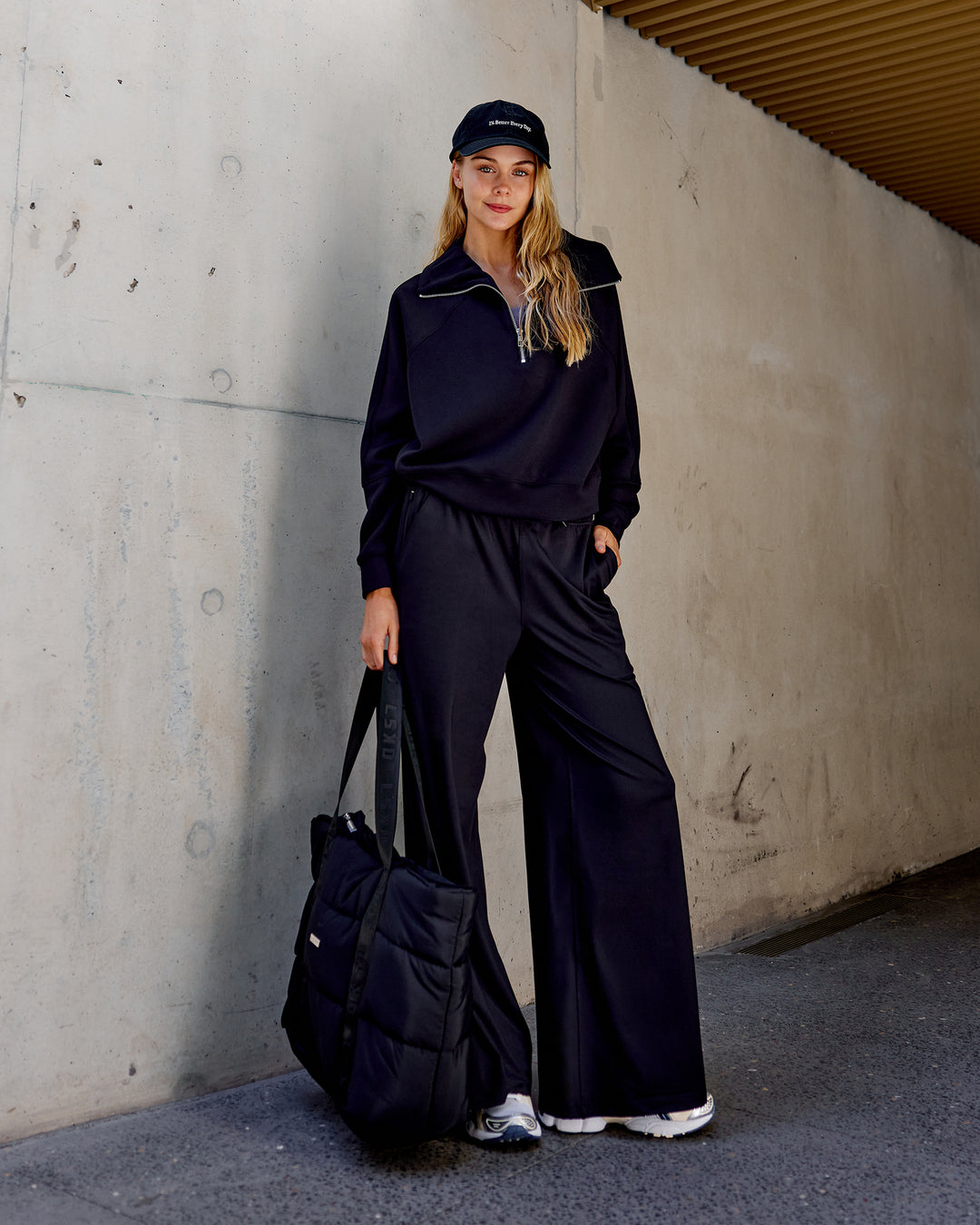 Woman wearing Elevate SoftTouch 1/2 Zip Sweater - Black-Black - view 4