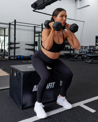 Woman wearing Elixir Ultra High-Rise Maternity Full Length Legging - Black | Model:Amanda | Size:S | Thumbnail Index: 2