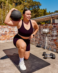 Woman wearing Evoke Sports Bra - Mulberry | Thumbnail Index: 3