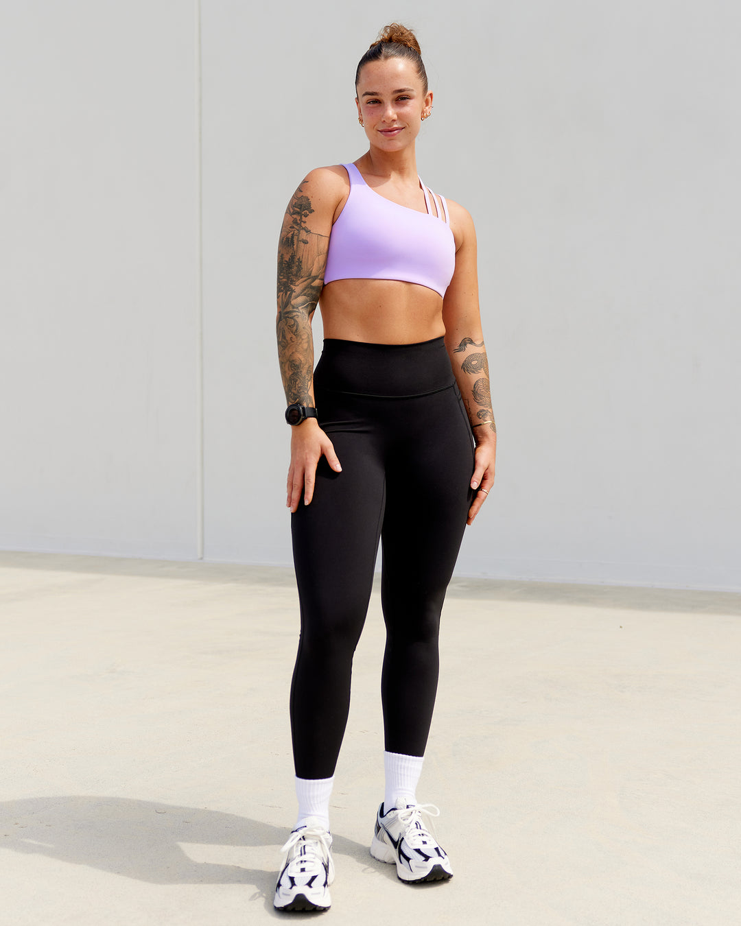 Woman wearing Galvanise Sports Bra - Pale Lilac - view 1