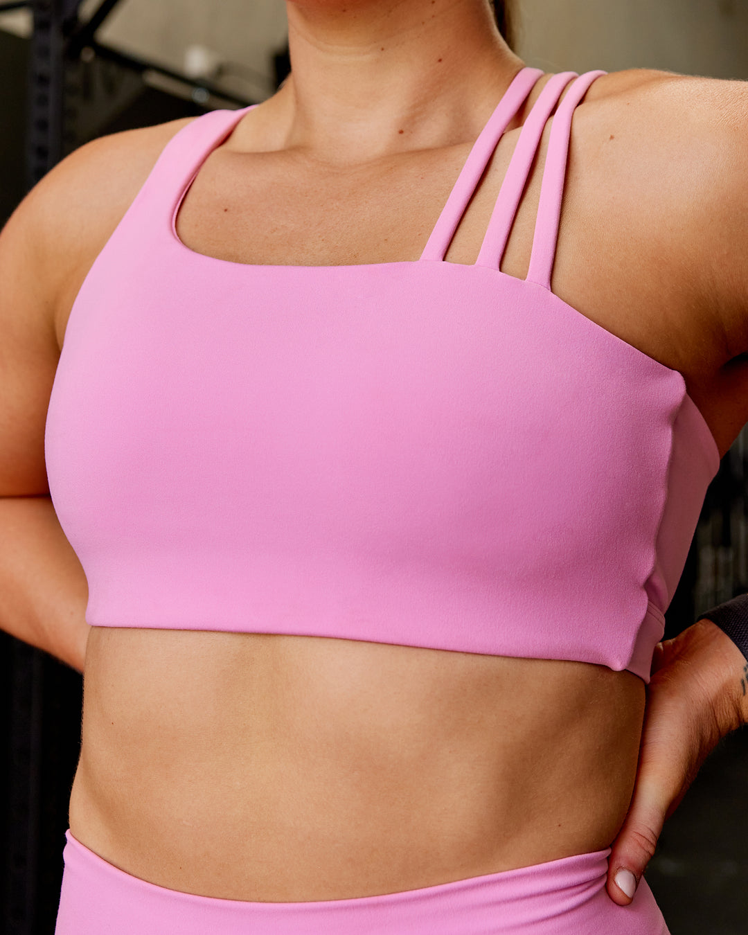 Woman wearing Galvanise Sports Bra - Spark Pink - view 4