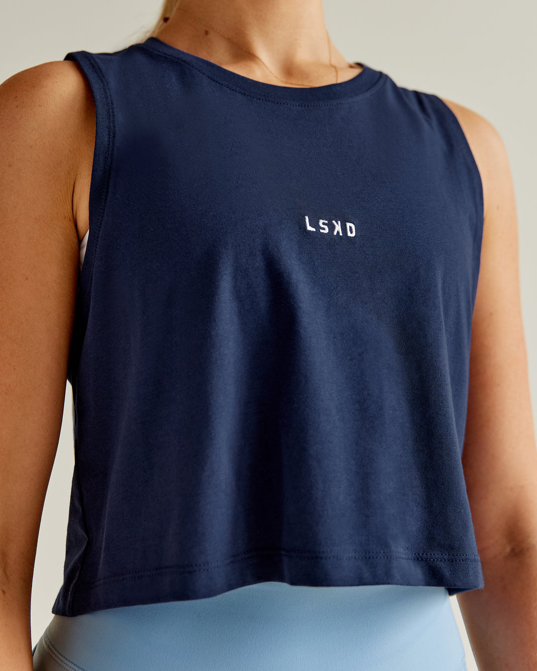 Woman wearing Go-To FLXCotton Tank - Future Navy-White - view 1