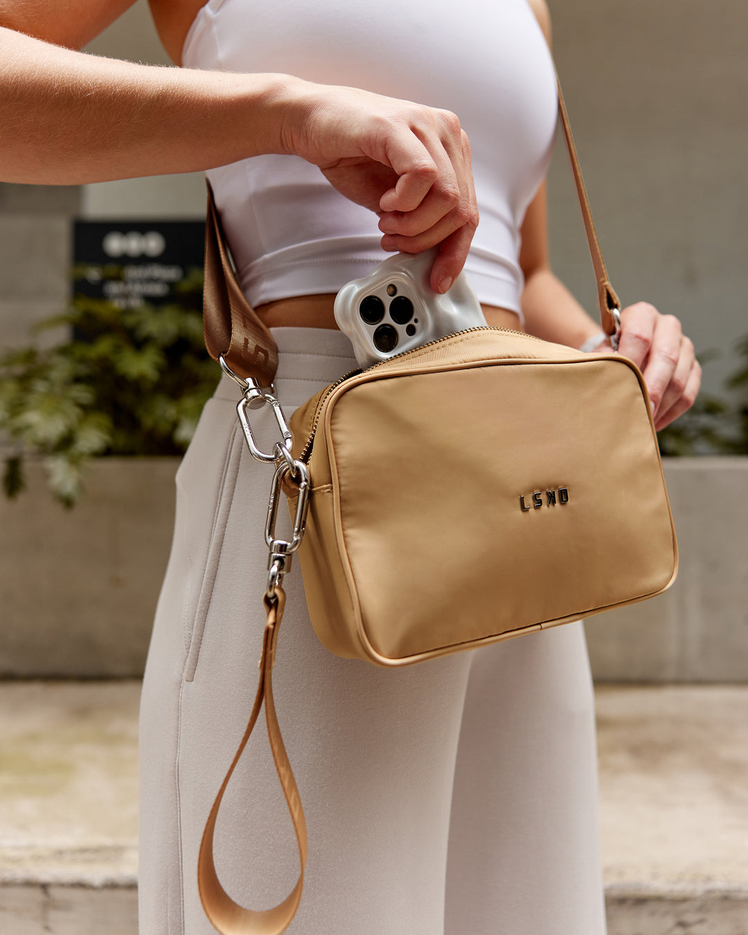 Woman wearing Go-To Shoulder Bag - Oat Milk - view 2