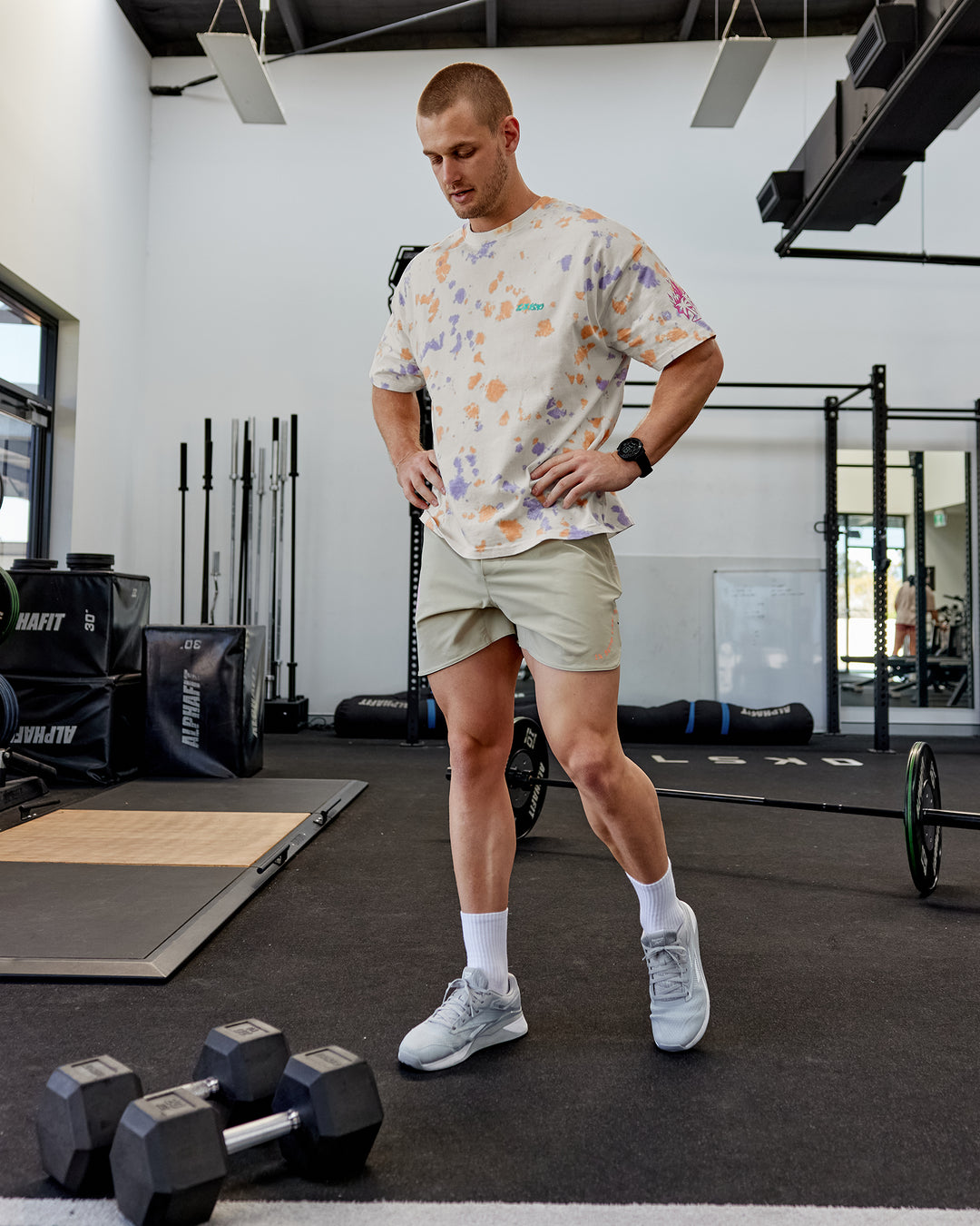 Man wearing Lift 6" Performance Shorts - Sand-So Cal 24 - view 3