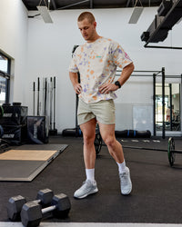 Man wearing Lift 6" Performance Shorts - Sand-So Cal 24 | Thumbnail Index: 2