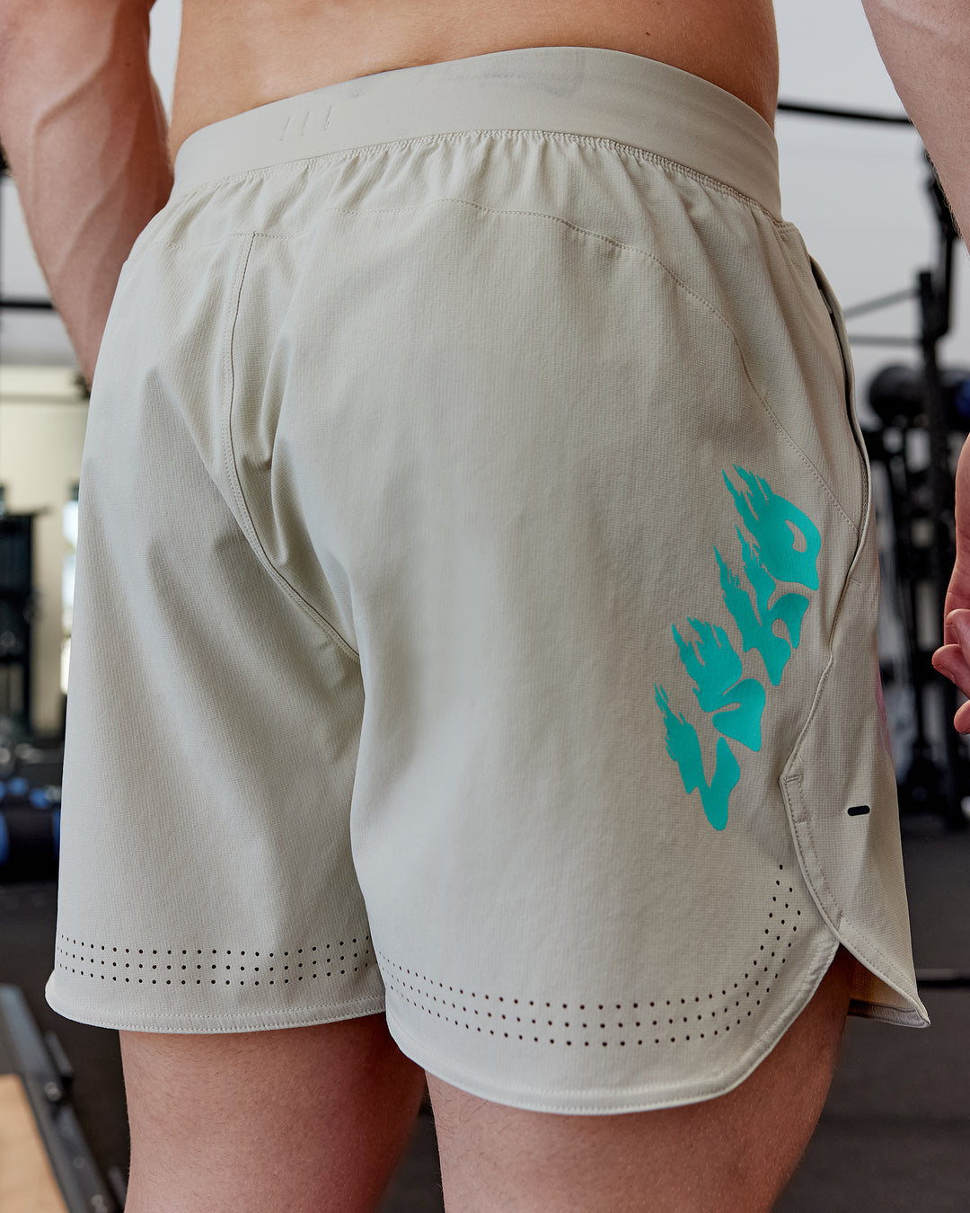 Man wearing Lift 6" Performance Shorts - Sand-So Cal 24 - view 4