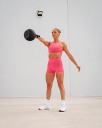 Woman wearing Lift High Neck Sports Bra - Hot Pink | Thumbnail Index: 2