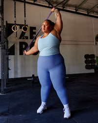 Woman wearing Lift Performance Tank - Glacial Blue | Thumbnail Index: 1