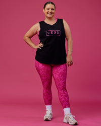 Woman wearing Luna FLXCotton Longline Tank - Black-Ultra Pink | Thumbnail Index: 0