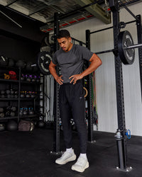 Man wearing AeroFLX+ Seamless Tee - Pirate Black Marl | Thumbnail Index: 3
