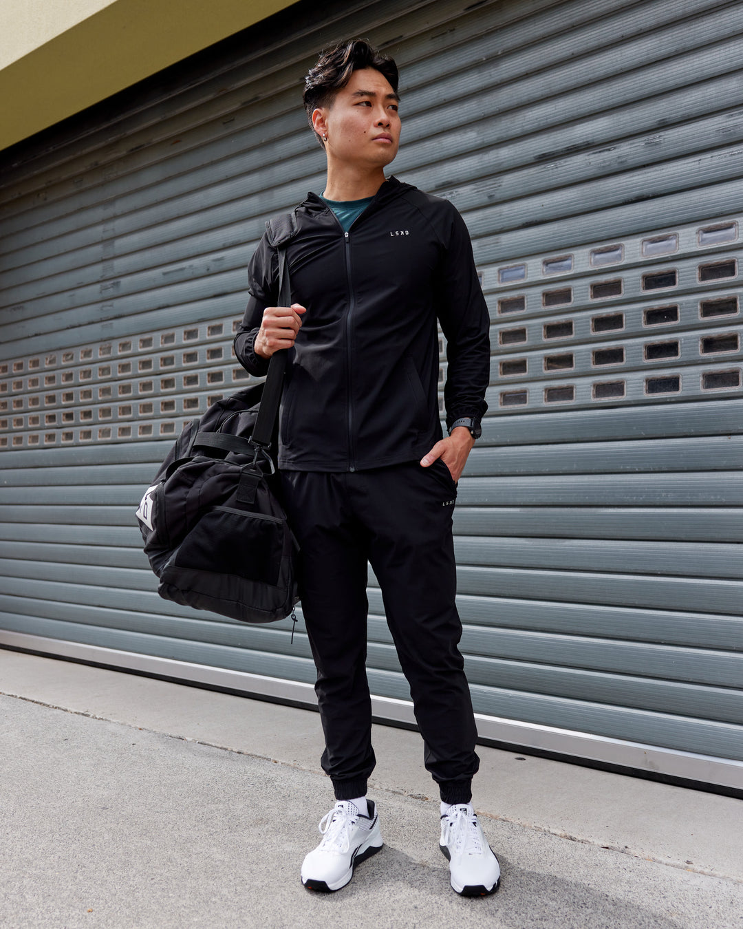 Man wearing Train-Lite FLXMAX Jacket - Black - view 5