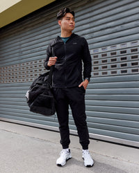 Man wearing Train-Lite FLXMAX Jacket - Black | Thumbnail Index: 4